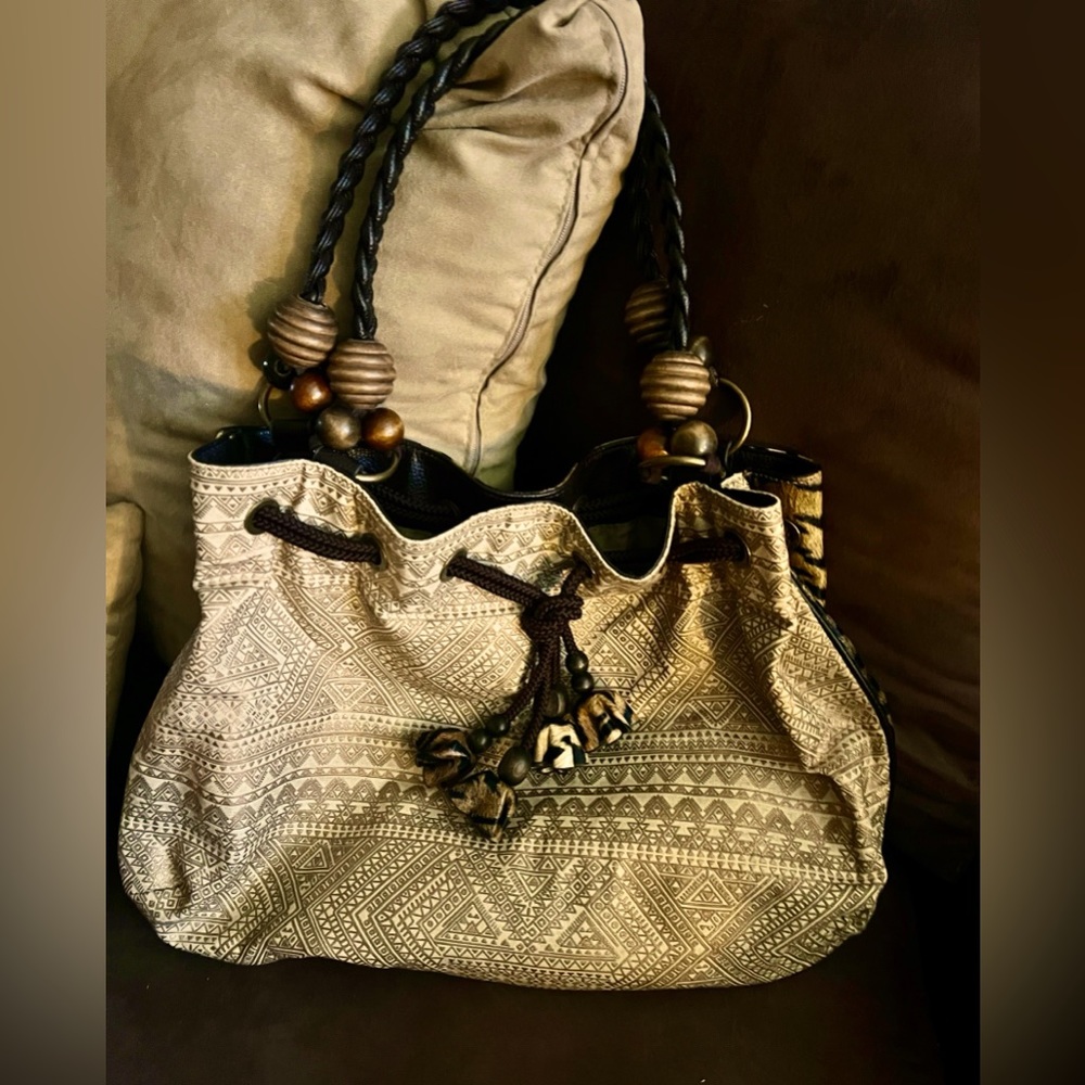 Chico tiger print handbag/ purse w/drawstrings. New without tags.